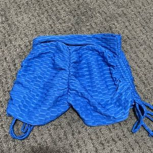 Blue ruffled gym shorts